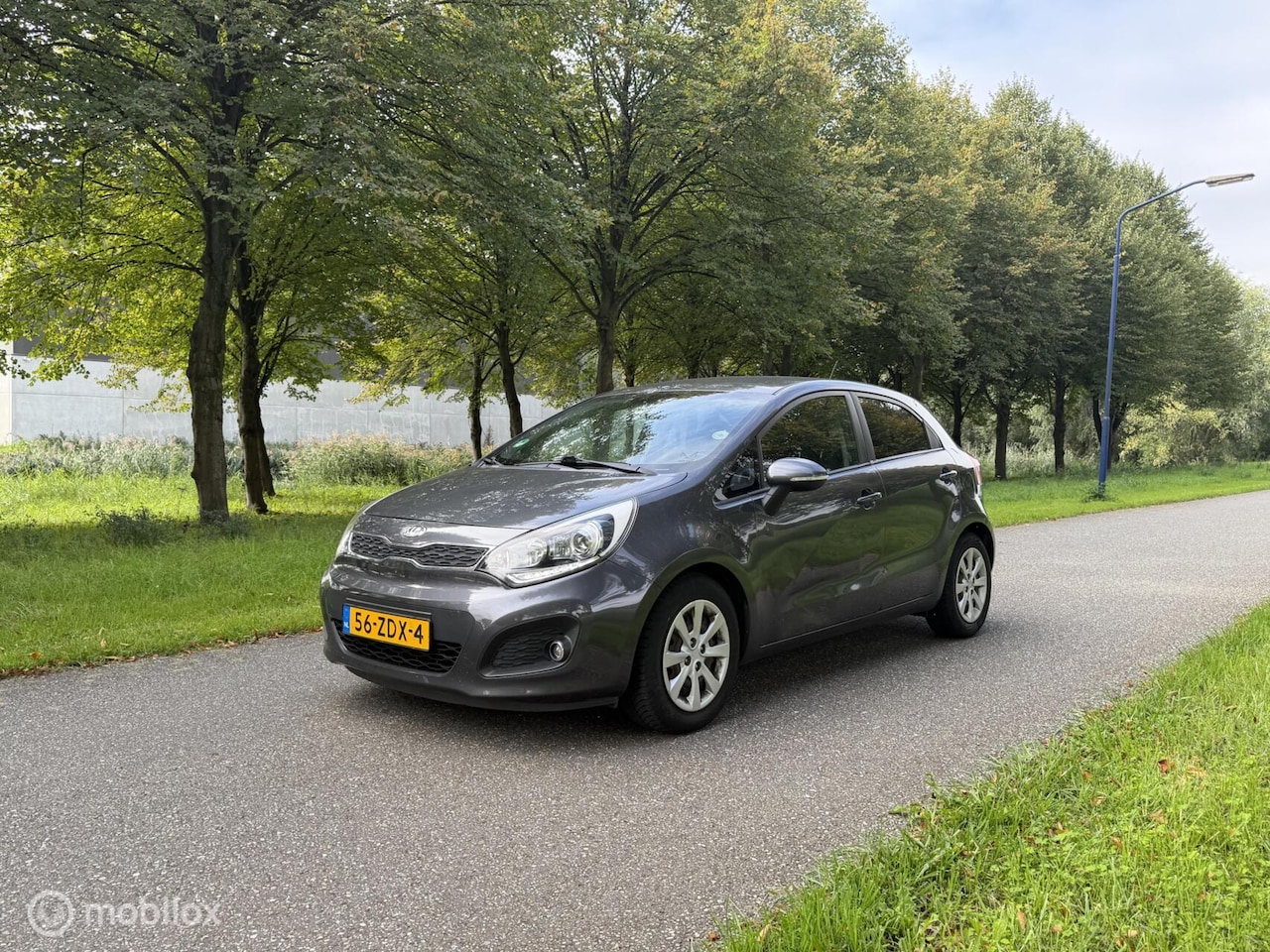 Kia Rio - 1.2 CVVT Super Pack*KEYLESS*CRUISE*SCHERM*BLUETOOTH - AutoWereld.nl