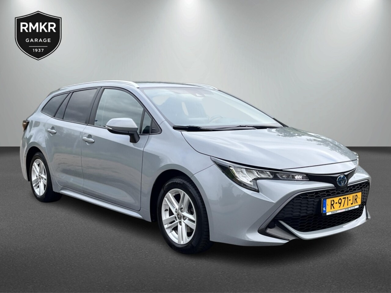 Toyota Corolla Touring Sports - 1.8 Hybrid Active + Navigatie - AutoWereld.nl