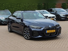 BMW i4 - eDrive35 High Executive 70 kWh / SoH 97, 5% / 14.818 km / Trekhaak / Schuifdak / 360Camera