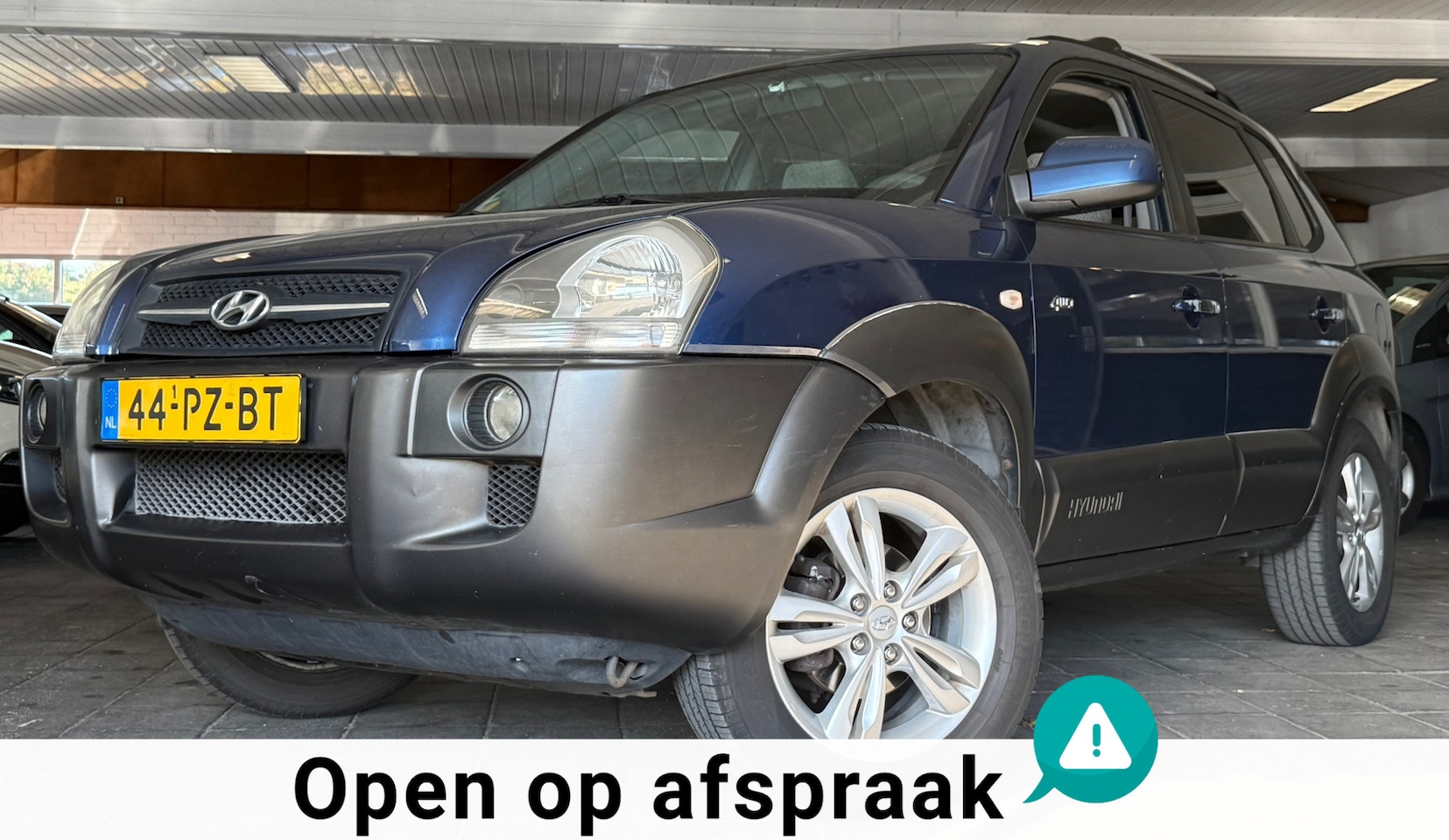Hyundai Tucson - 2.0i 4WD Style|NAP|NweAPK|Airco|CruiseControl|Trekhaak|Elekramen - AutoWereld.nl