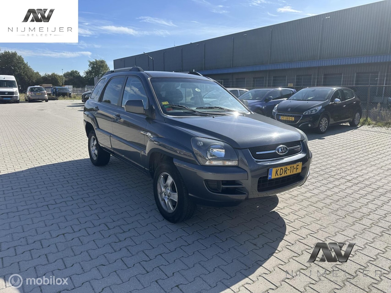 Kia Sportage - 2.0 CVVT X-ecutive 4WD 1e eignaar,airco,isofix - AutoWereld.nl