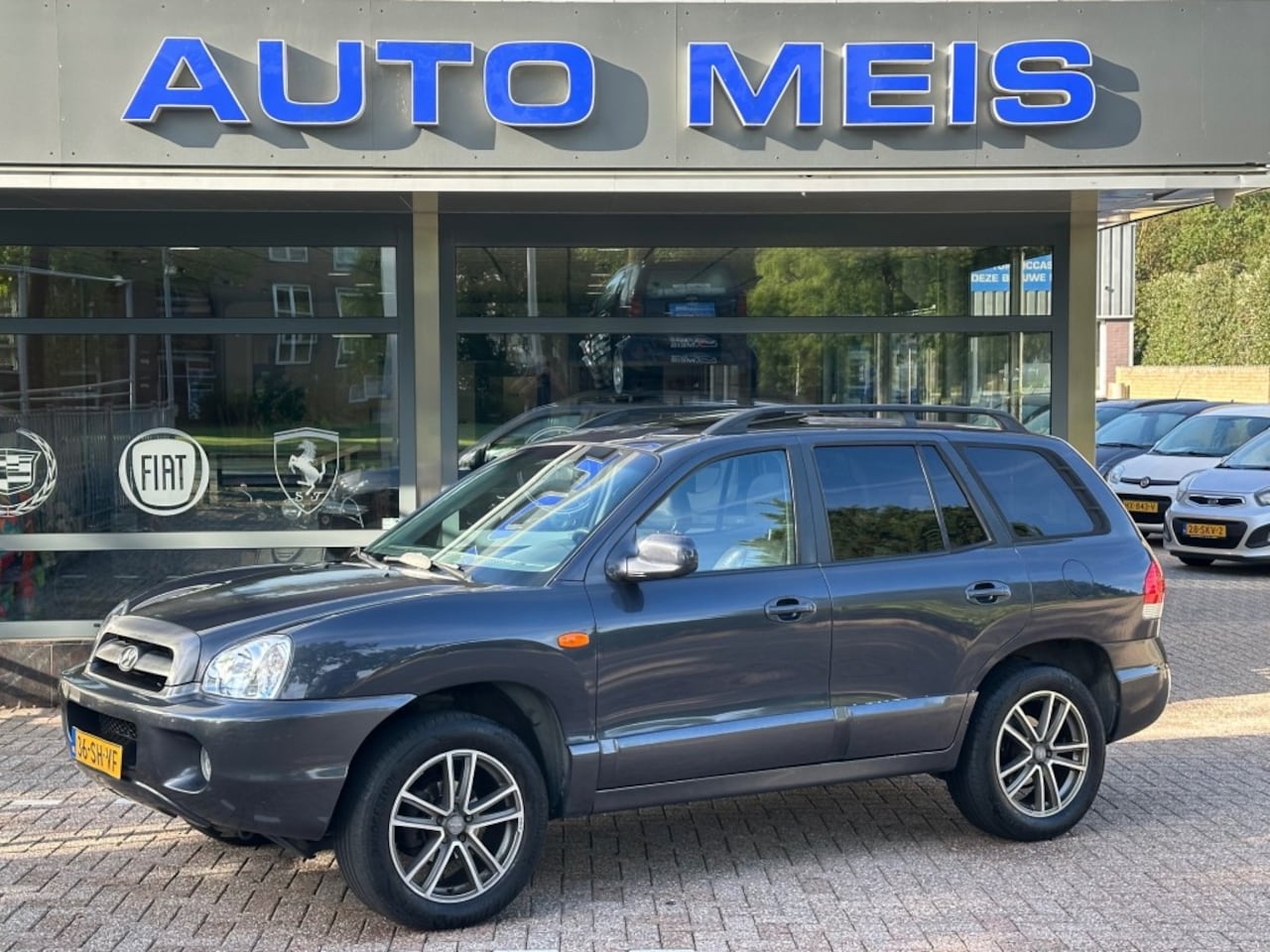 Hyundai Santa Fe - 2.0i-16V Business Edition Leer Cruise Panorama Trekhaak - AutoWereld.nl