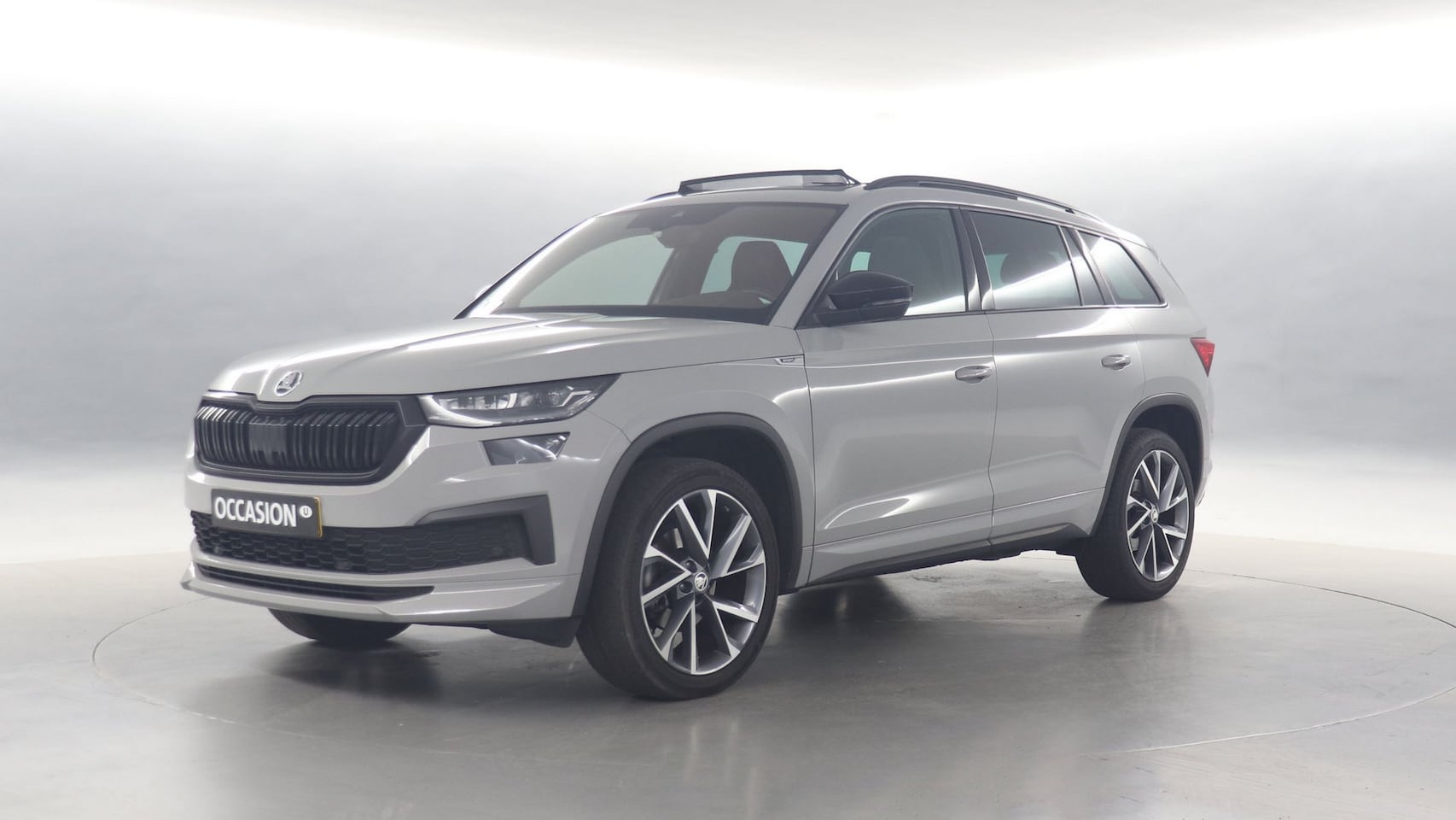 Skoda Kodiaq - 1.5 TSI 150pk Sportline Business DSG / Panoramadak / Stoelverwarming / Camera / Elek. vers - AutoWereld.nl