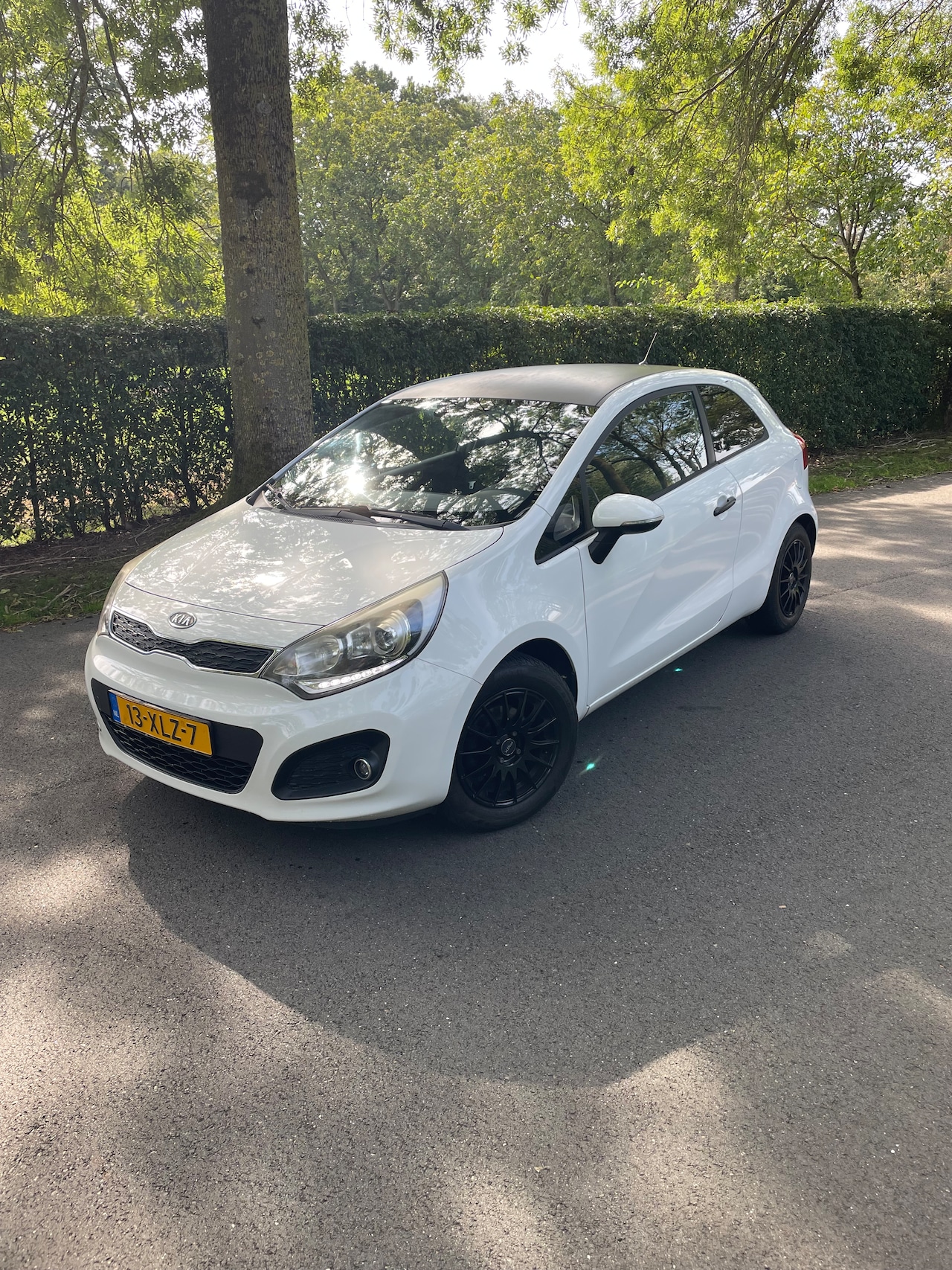 Kia Rio - 1.2 CVVT Plus Pack Sport - AutoWereld.nl
