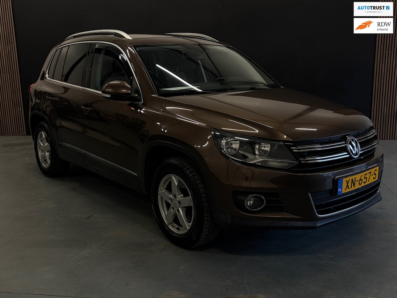 Volkswagen Tiguan - 1.4 TSI Sport&Style Trekhaak Camera Stoelverwarming - AutoWereld.nl