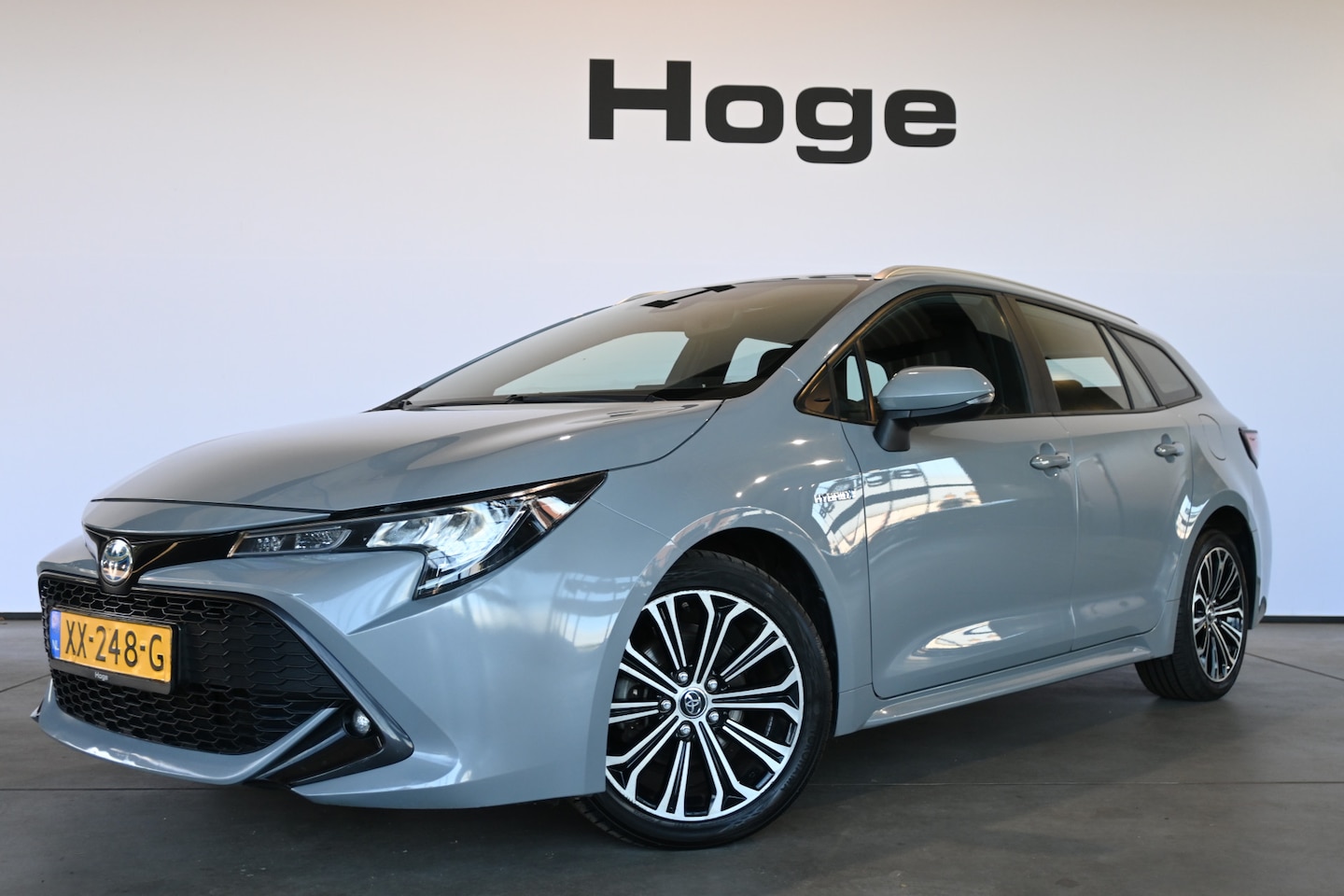 Toyota Corolla Touring Sports - 1.8 Hybrid First Edition Nap Clima Cruise Lane Assist Led Navigatie 1e Eigenaar! 100% Onde - AutoWereld.nl