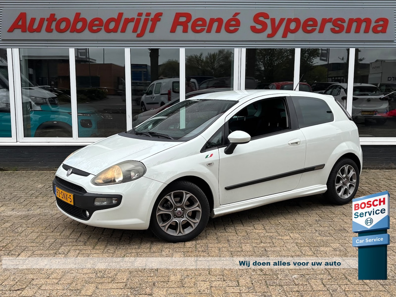 Fiat Punto Evo - 1.3 M-Jet Racing | Trekhaak | Bluetooth | Airco | Elektrische Ramen - AutoWereld.nl