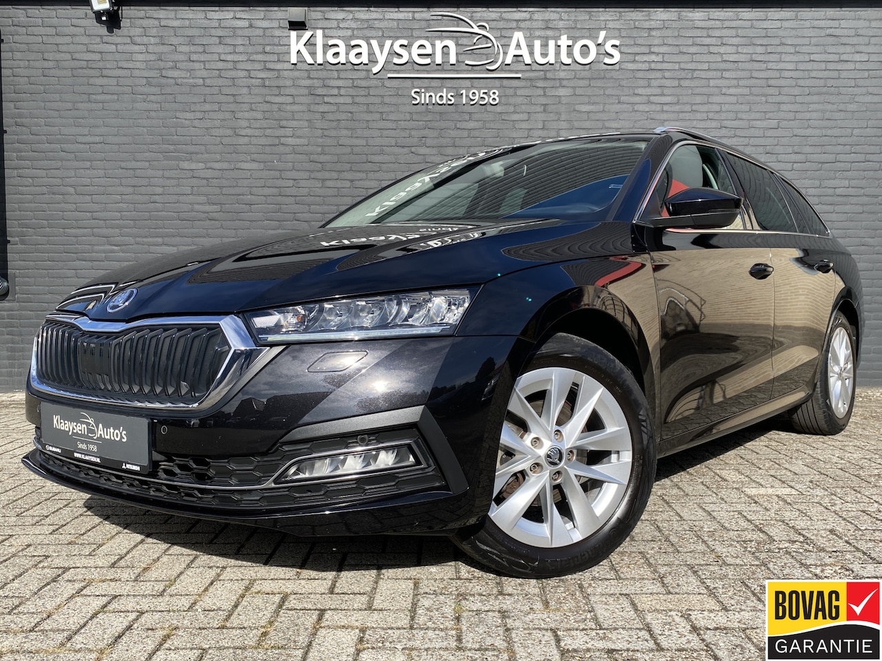 Skoda Octavia Combi - 1.0 e-TSI Business Edition Plus AUT. | 1e eigenaar | dealer onderh. | navigatie | trekhaak - AutoWereld.nl