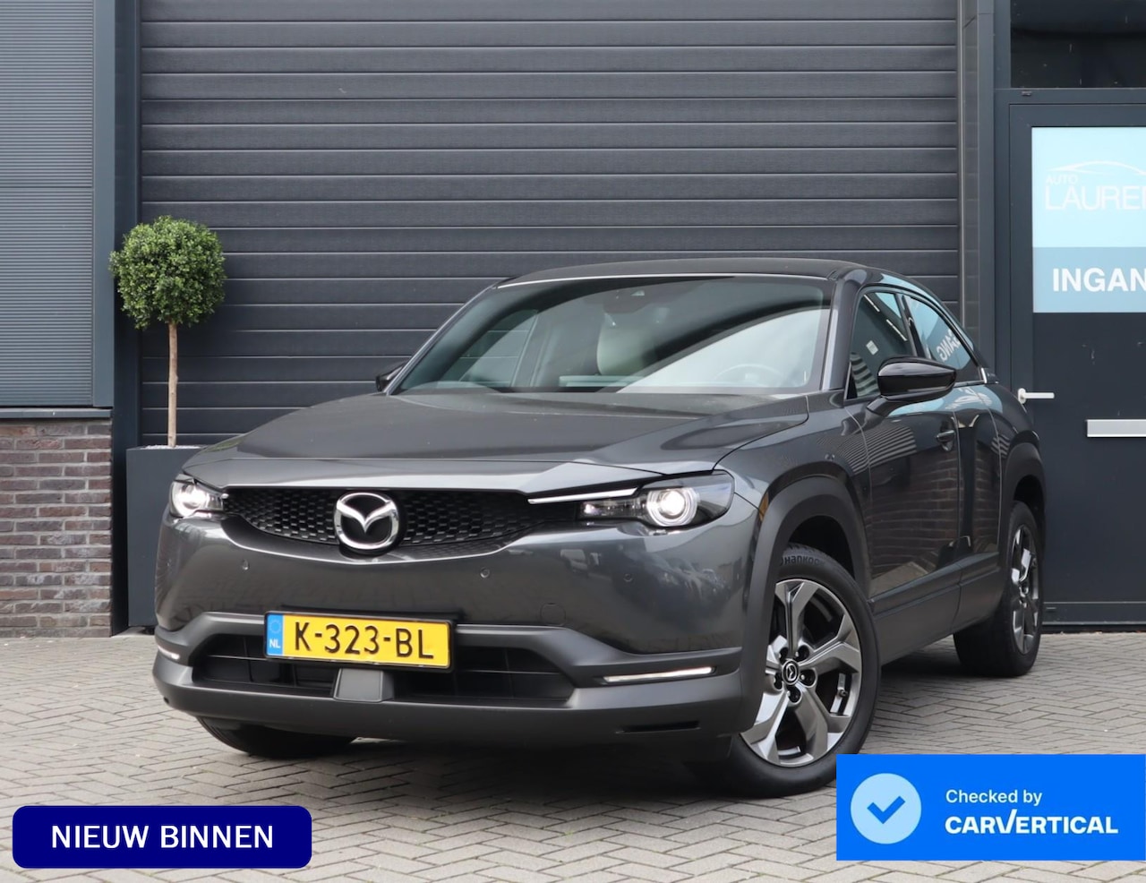 Mazda MX-30 - e-SkyActiv 145 First Edition 36 kWh | SOH 94% | Voorstoelen verwarmd | HUD | Camera | Memo - AutoWereld.nl