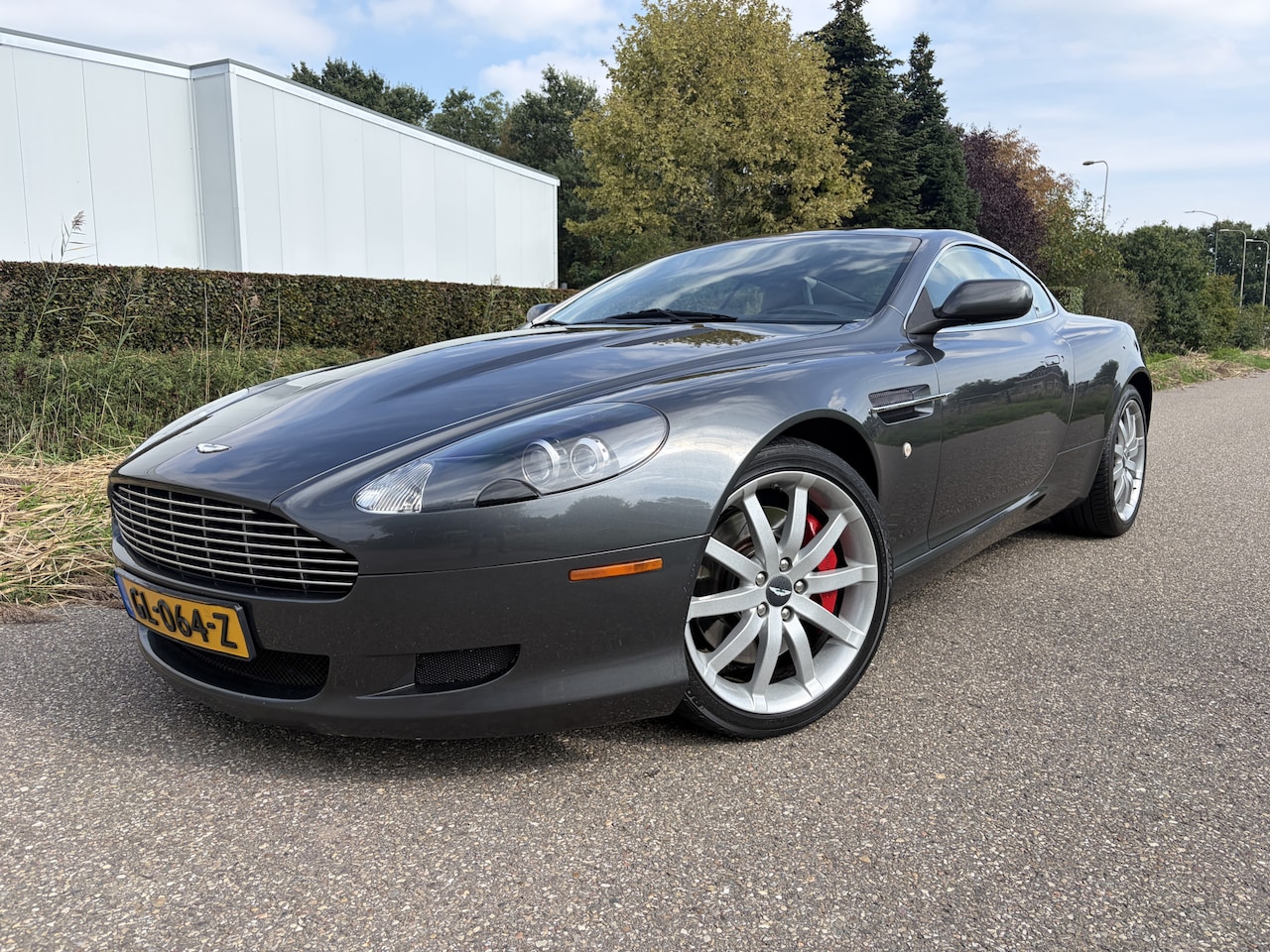 Aston Martin DB9 - 5.9 V12 Touchtronic / AUTOMAAT / LEER / NAVI / 85dkm! - AutoWereld.nl