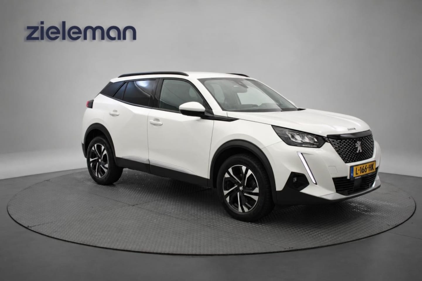Peugeot 2008 - 1.2 PureTech Allure Pack - Carplay, Clima, Cruise, Half Leer - AutoWereld.nl
