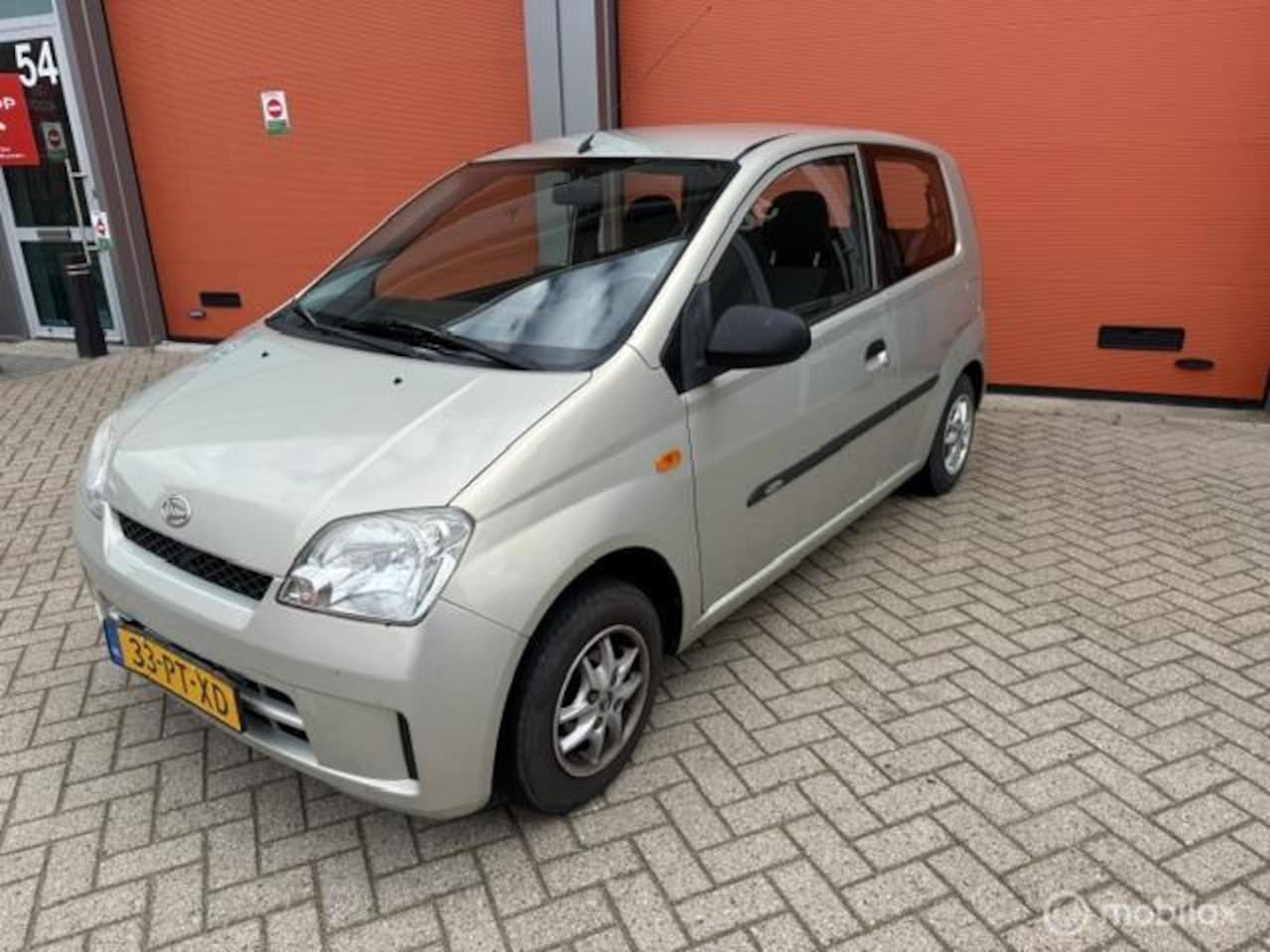 Daihatsu Cuore - 1.0-12V Osaka 99.000 KM NAP-APK 2027 - AutoWereld.nl