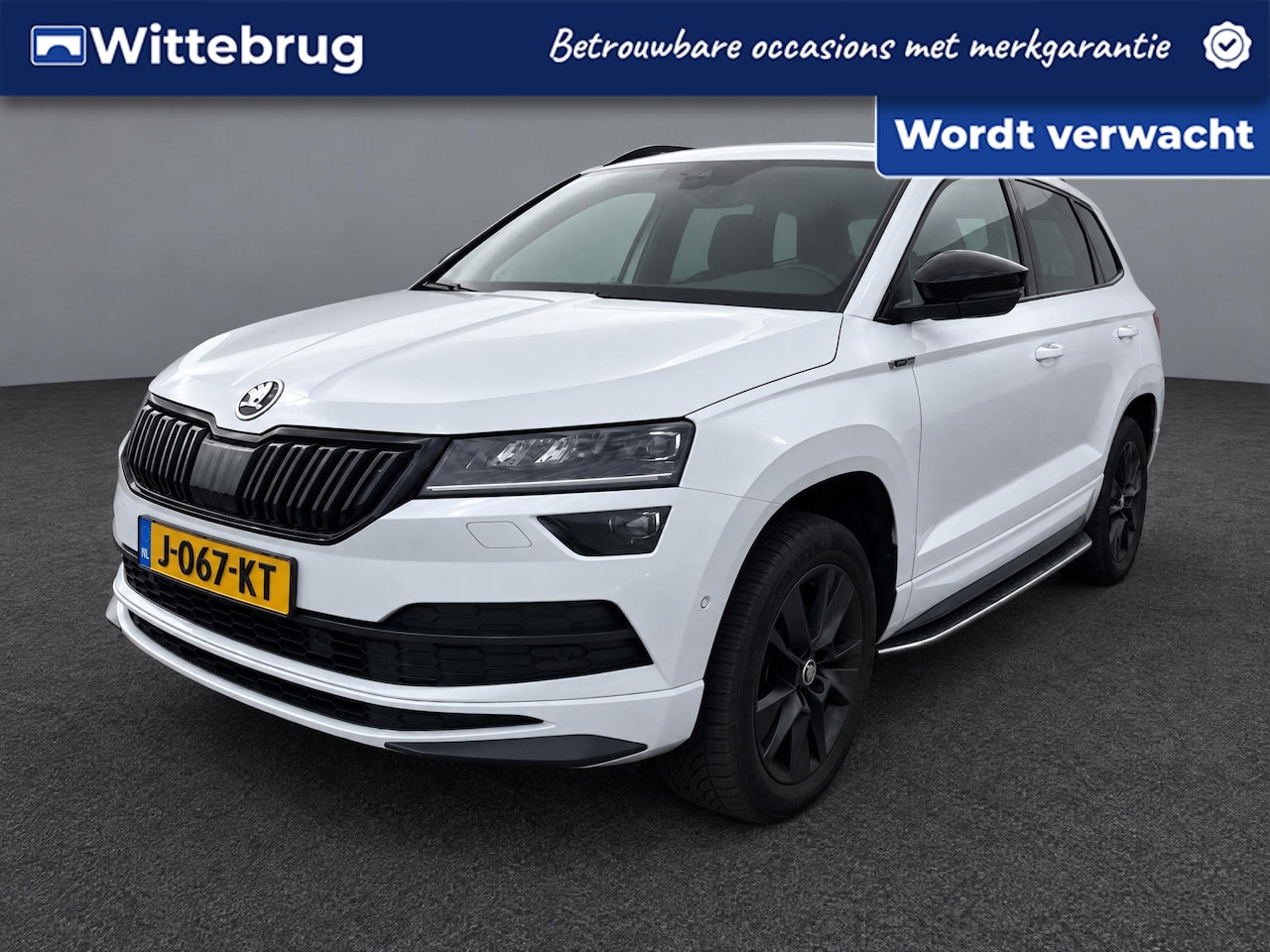 Skoda Karoq - 1.5 TSI ACT Sportline Business / Pano / Digitaal dashboard / App connect / Navigatie / Can - AutoWereld.nl