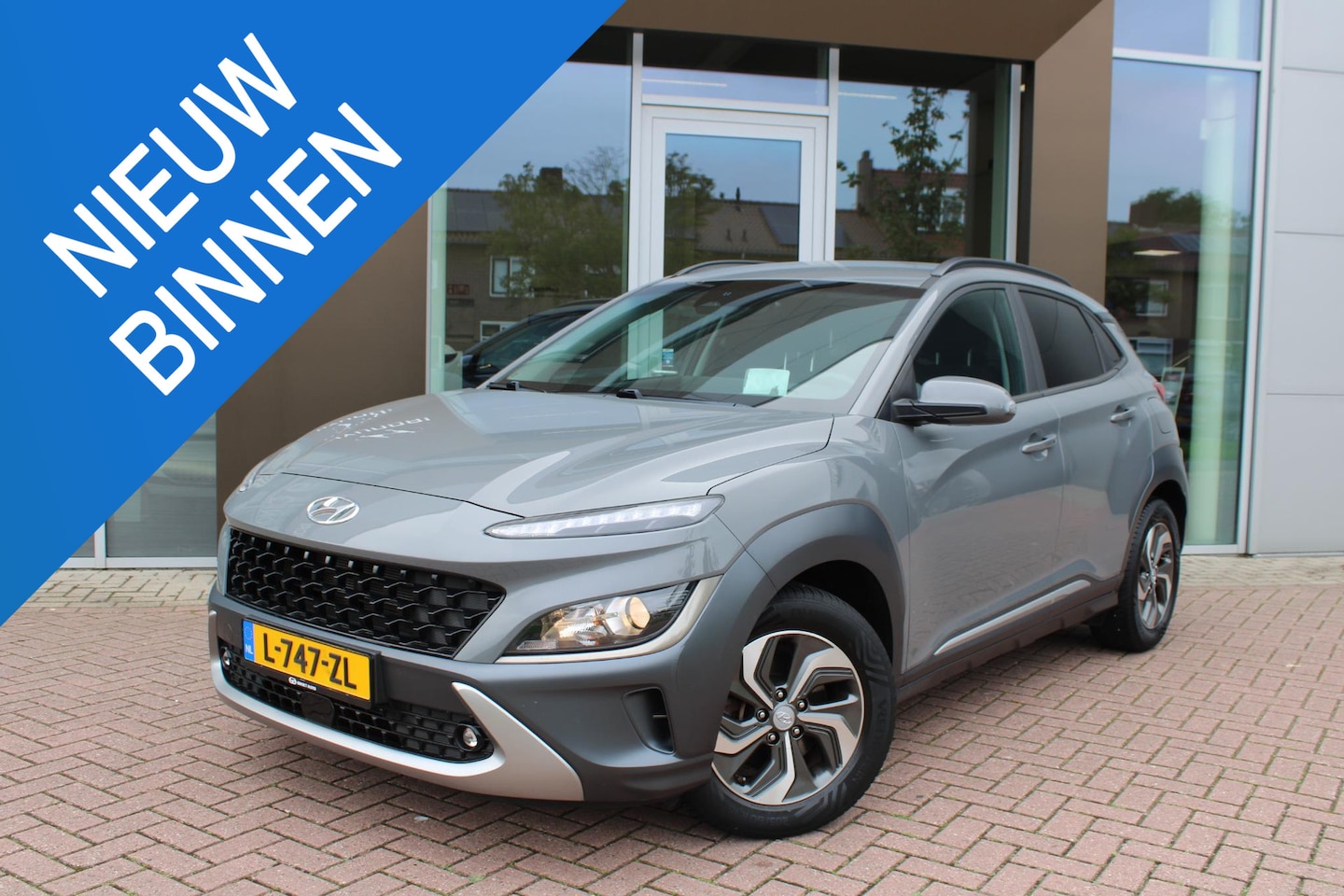 Hyundai Kona - 1.6 GDI HEV Fashion Hybrid Automaat Airco Navi Camera Carplay 42dkm Nieuwstaat - AutoWereld.nl