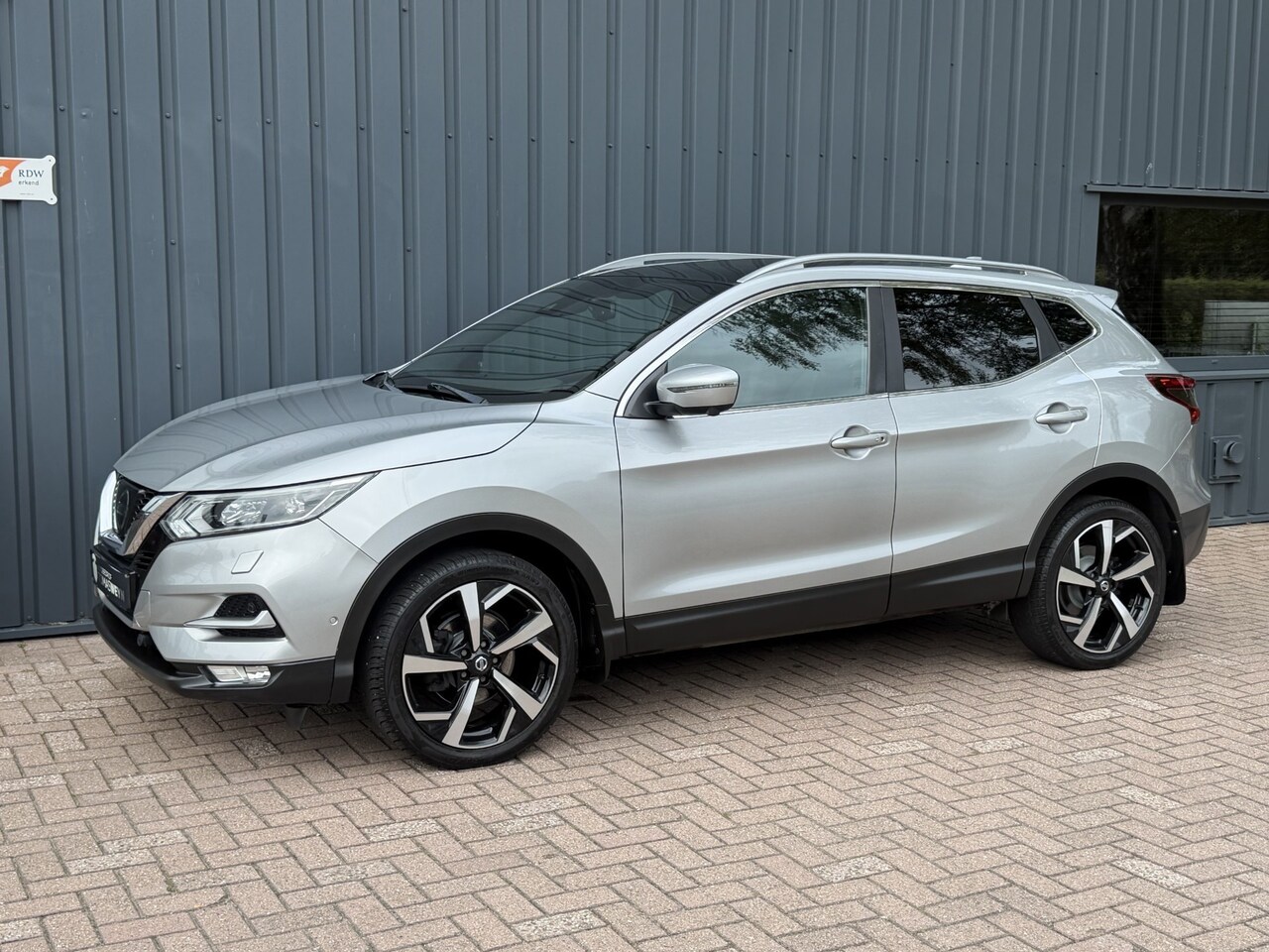 Nissan Qashqai - 1.2 Tekna + AUTOMAAT!/DEALER OND.!/APK!/NAVI!/ - AutoWereld.nl