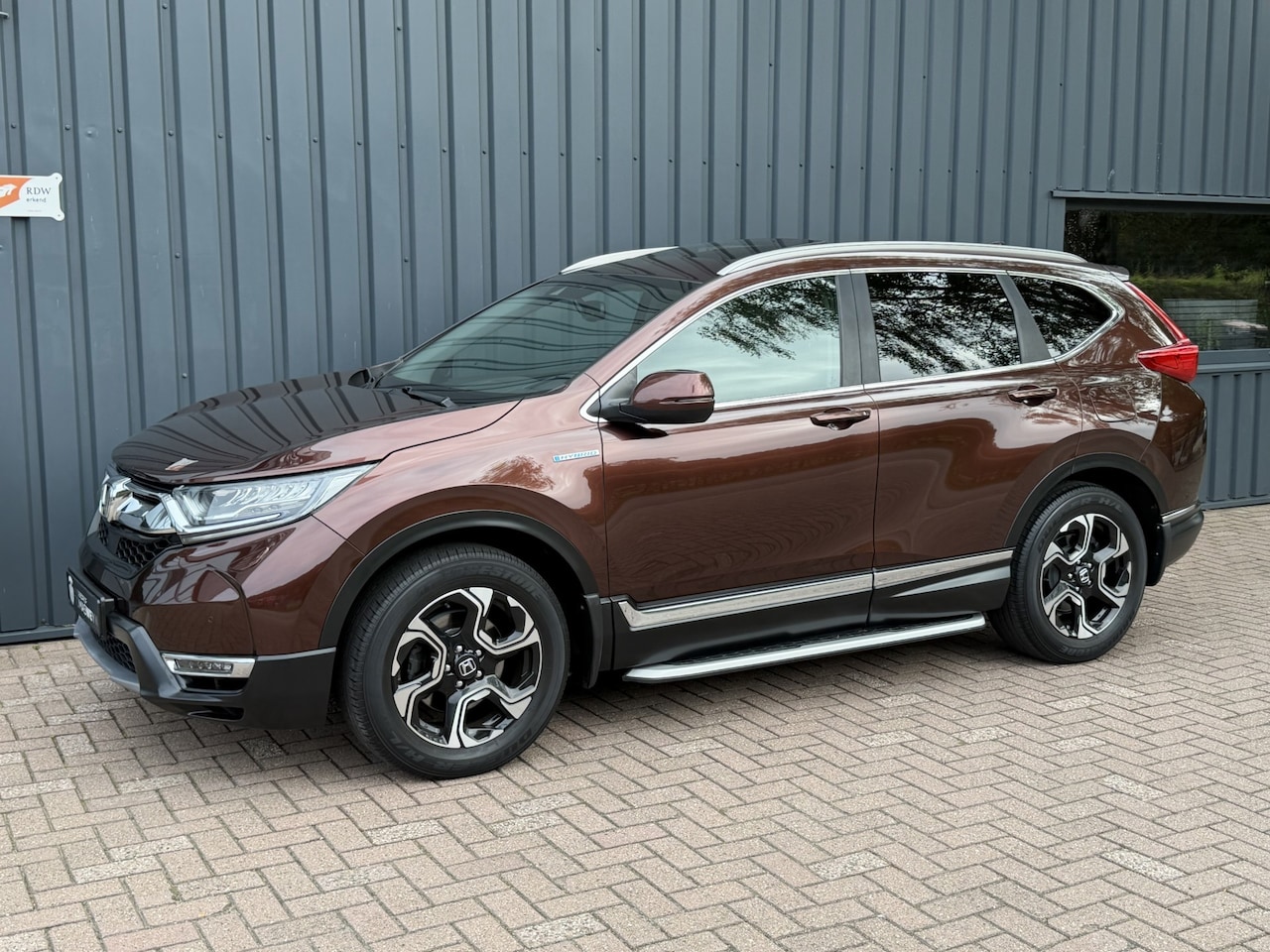 Honda CR-V - 2.0 Hybrid AWD Executive DEALER OND.!/95.824 KM!/COMPLEET!/ - AutoWereld.nl