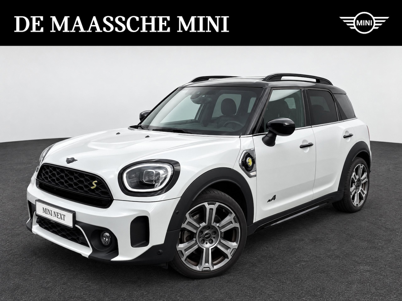 MINI Countryman - Cooper S E ALL4 Automaat / Panoramadak / Comfort Access / Achteruitrijcamera /  Head-Up / - AutoWereld.nl