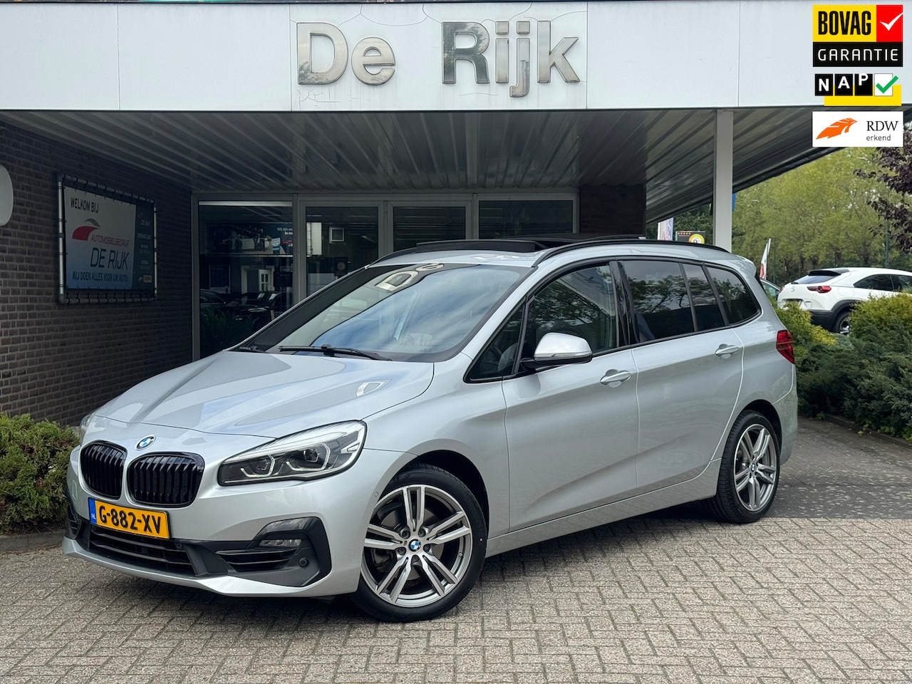 BMW 2-serie Gran Tourer - 218i 7p. High Executive | Pano, Leder, Navi, Camera, Stoelverw., Cruise, Climate | Dealero - AutoWereld.nl