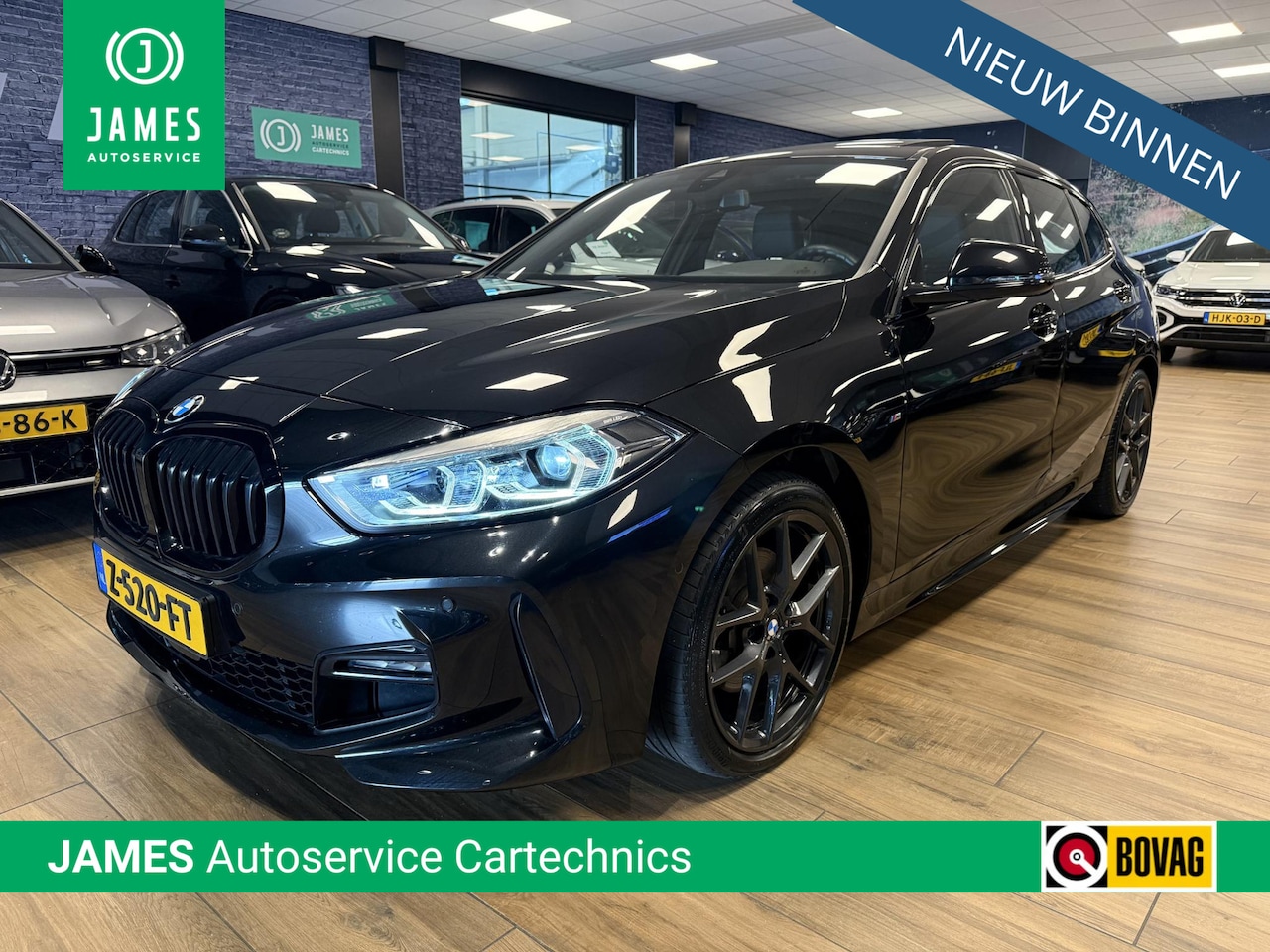 BMW 1-serie - 118i High Executive M| M aero-kit|M onderstel|M leerstuurwiel|Elek. achterklep|PANO|Stuur - AutoWereld.nl