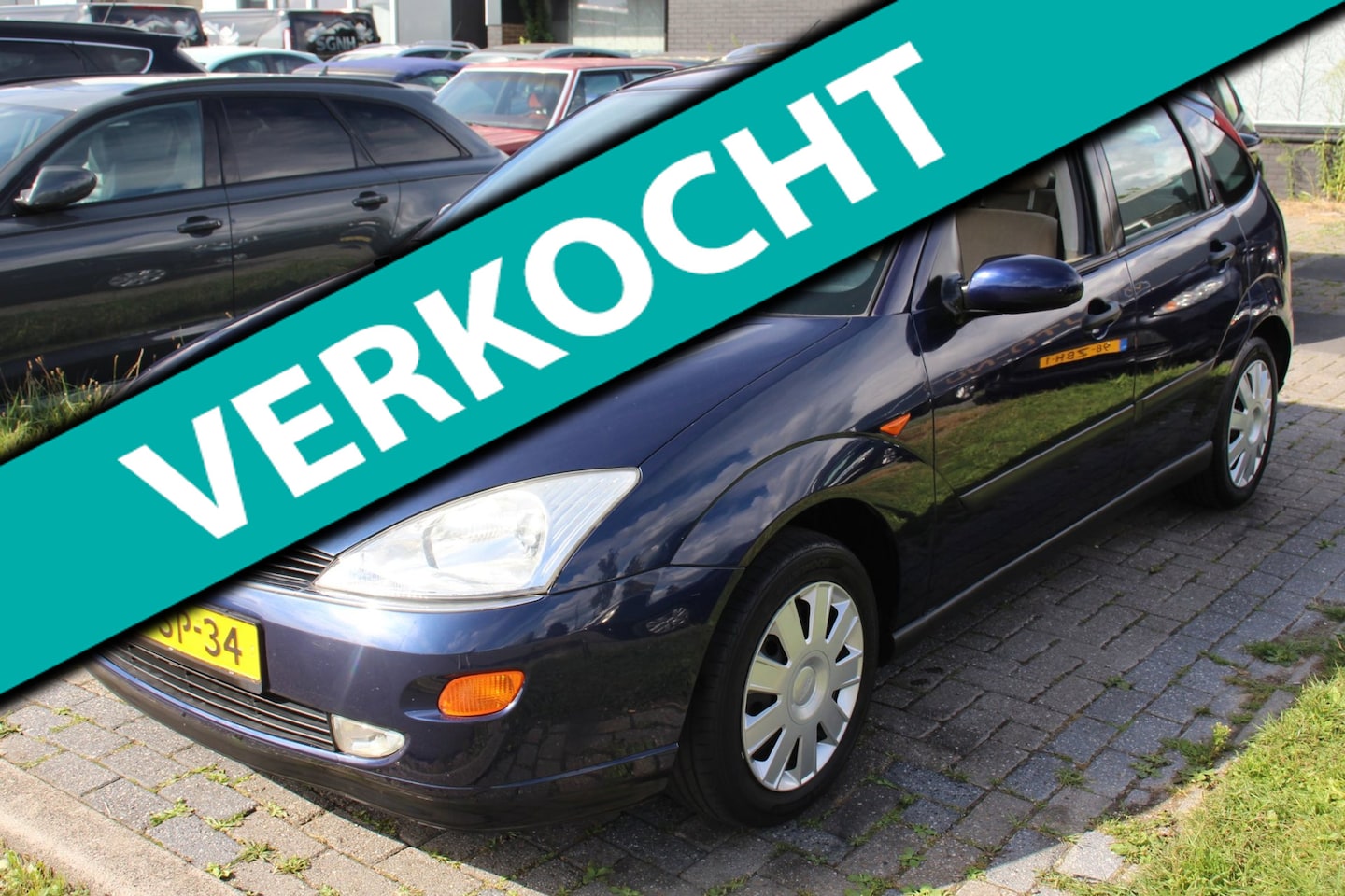 Ford Focus - 1.6-16V Ghia Dagtopper! Nu €995,- 5-Deurs Airco 166.000km NAP! APK juli 2027! Notenhout Tr - AutoWereld.nl