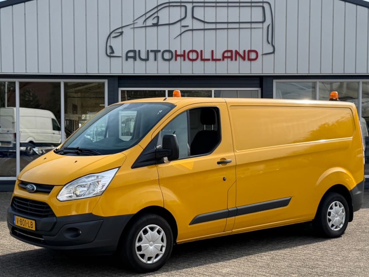 Ford Transit Custom - 2.0 TDCI 77KW 105PK L2H1 EURO 6 AIRCO/ CRUISE CONTROL/ TREKHAAK/ 100% DEALERONDERHOUDEN - AutoWereld.nl