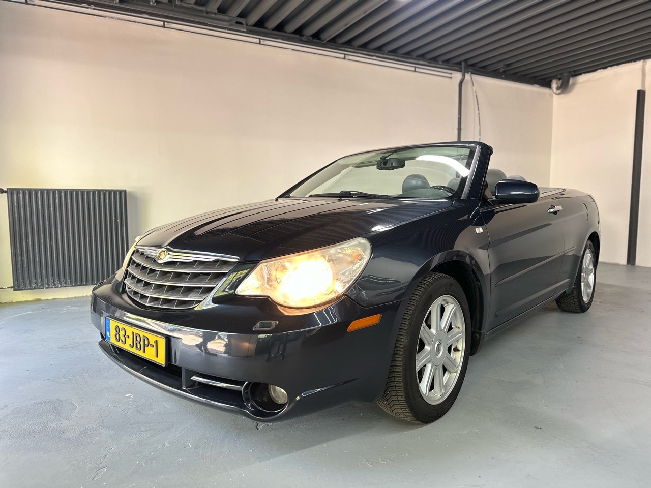 Chrysler Sebring Cabrio - 2.7 Limited Business Edition 2.7 Limited Business Edition - AutoWereld.nl