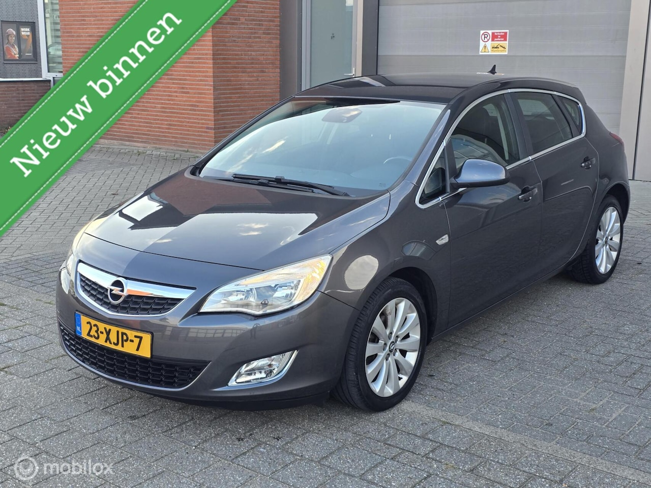 Opel Astra - 1.4 TurboCosmo_140pk_Pas G.buert geweest - AutoWereld.nl
