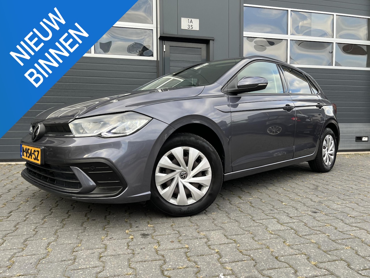 Volkswagen Polo - 1.0 TSI Go *CARPLAY*ECC*PDC - AutoWereld.nl