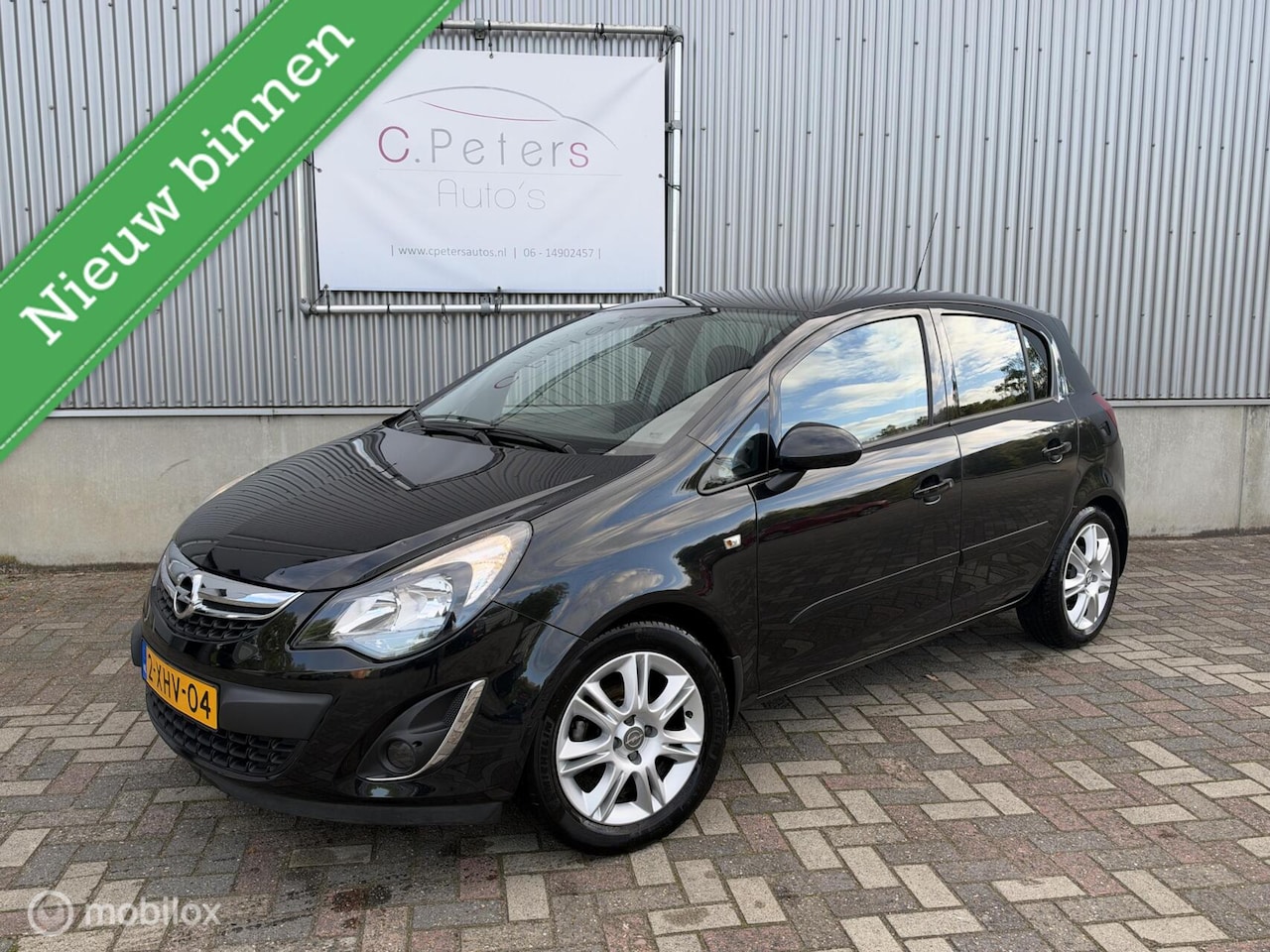 Opel Corsa - 1.4-16V 100pk BlitZ 2014 / Navigatie / Trekhaak / Climate control / Parkeersensor / Cruise - AutoWereld.nl