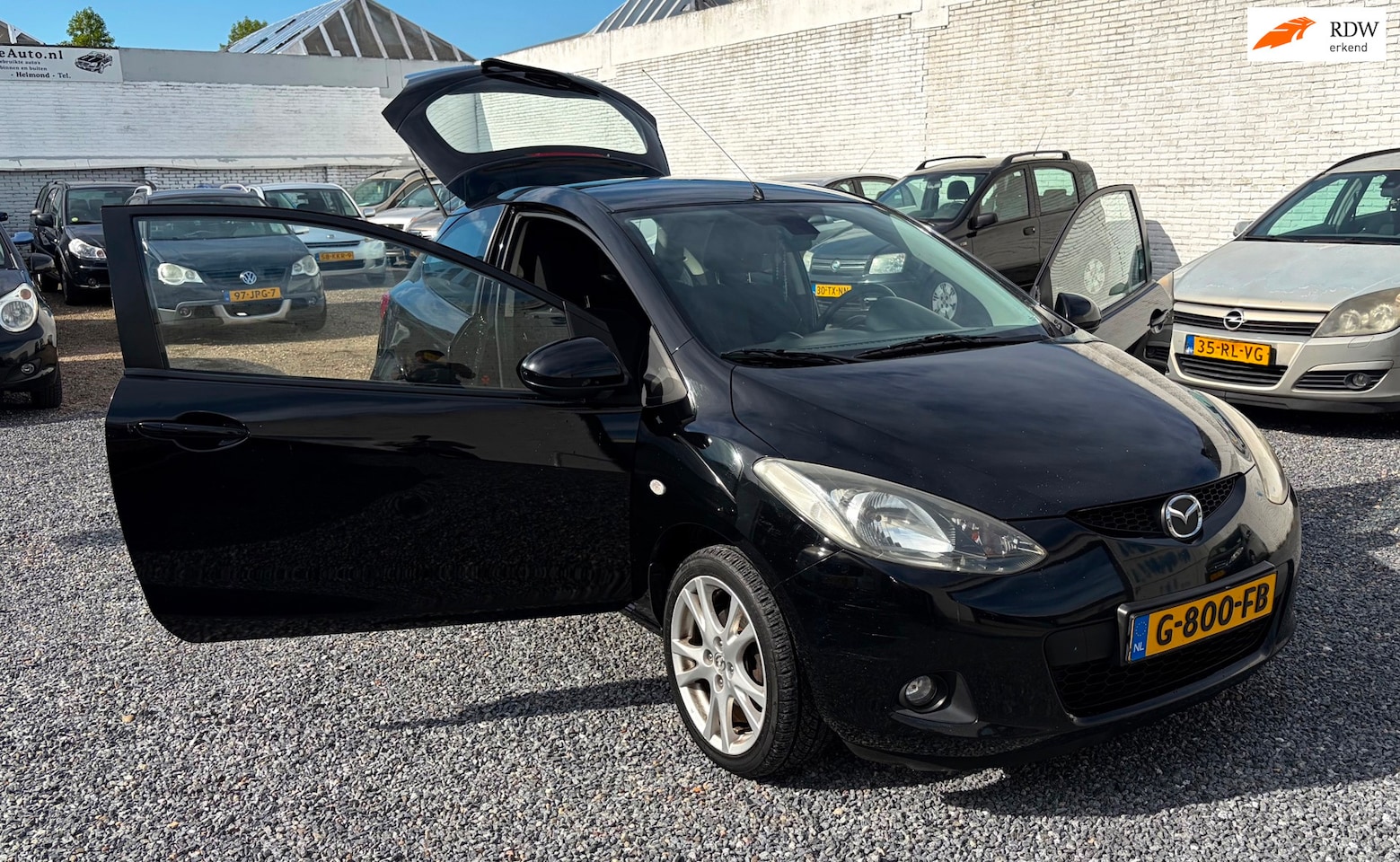 Mazda 2 - 1.3hp S-VT Touring | Stoelverwarming | Airco - AutoWereld.nl