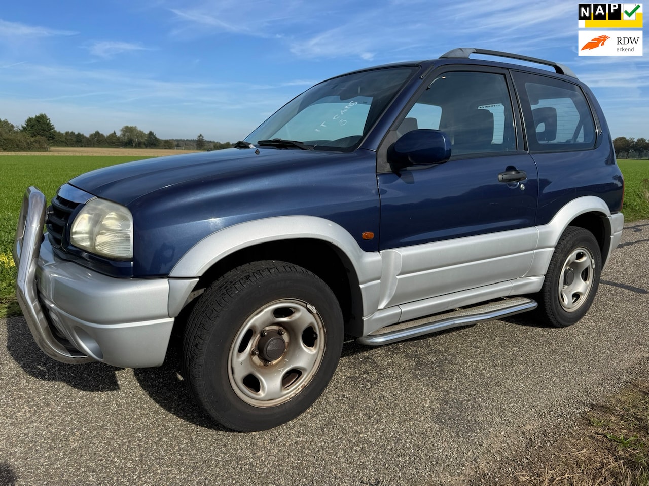 Suzuki Grand Vitara - 1.6 Metal Top Wide Body 1.6 Metal Top Wide Body|Nieuwe APK| - AutoWereld.nl
