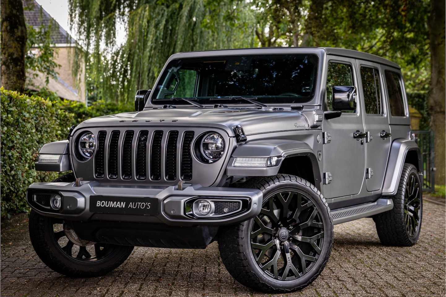 Jeep Wrangler Unlimited - 4xe 380 Brute Richmond Softtop Skyroof Matte lak - AutoWereld.nl