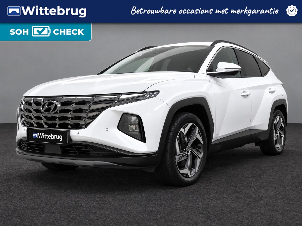 Hyundai Tucson - 1.6 T-GDI PHEV Comfort Smart 4WD | Trekhaak | Navi | Krell | ACC | El. klep | Stoel/stuurv - AutoWereld.nl