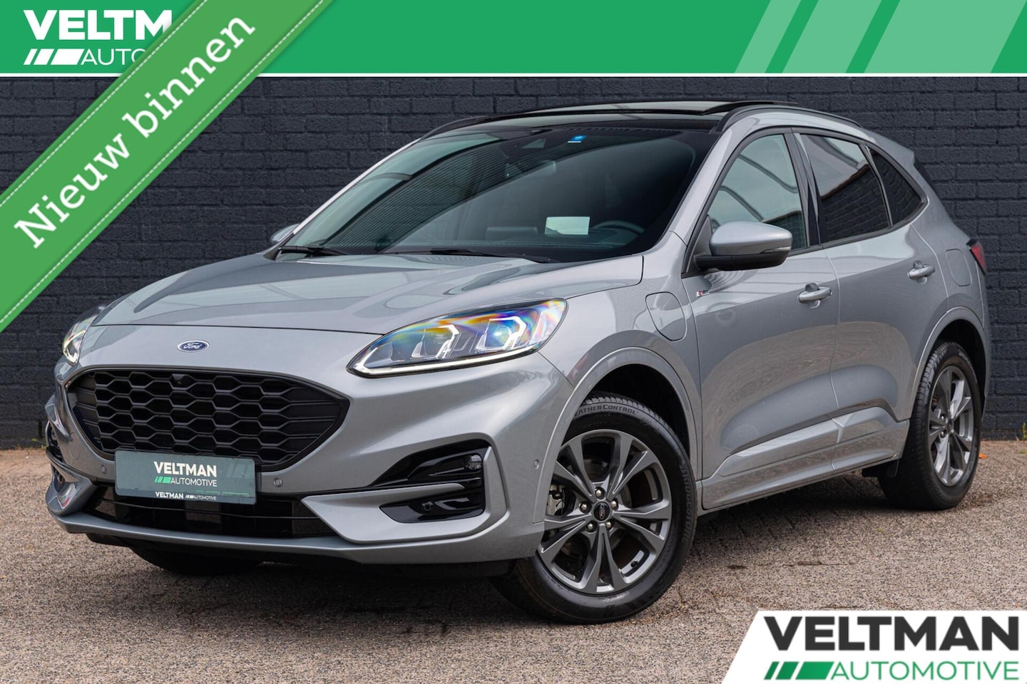 Ford Kuga - 2.5 PHEV ST-Line X PANO TREKHAAK ADAPTIVE CRUISE CAMERA STUURVERWARMING B&O - AutoWereld.nl