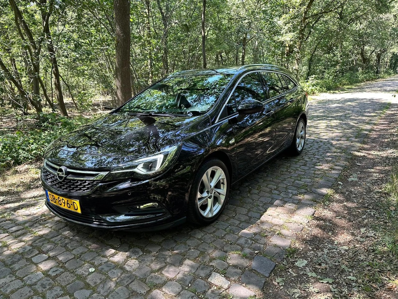 Opel Astra Sports Tourer - 1.0 Innovation navi clima cruise - AutoWereld.nl
