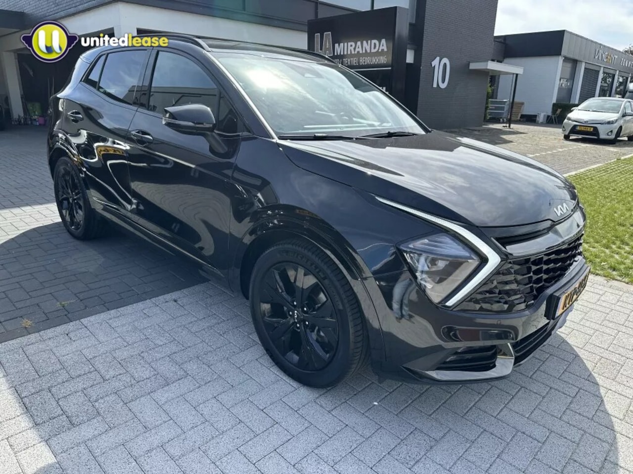 Kia Sportage - 1.6 T-GDi MHEV Dark Edition 1.6 T-GDi MHEV Dark Edition - AutoWereld.nl
