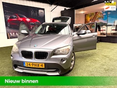 BMW X1 - 18i 5D NAP Airco Navi Trekhaak Parkeersensoren Elek.ramen Velgen