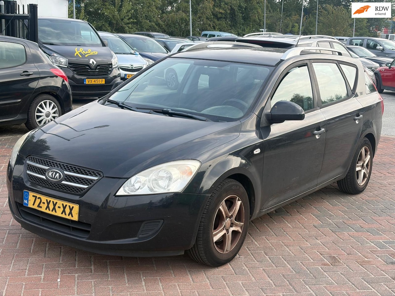 Kia Cee'd Sporty Wagon - 1.6 X-tra Airco! Zwart! EXPORTEXPORT - AutoWereld.nl