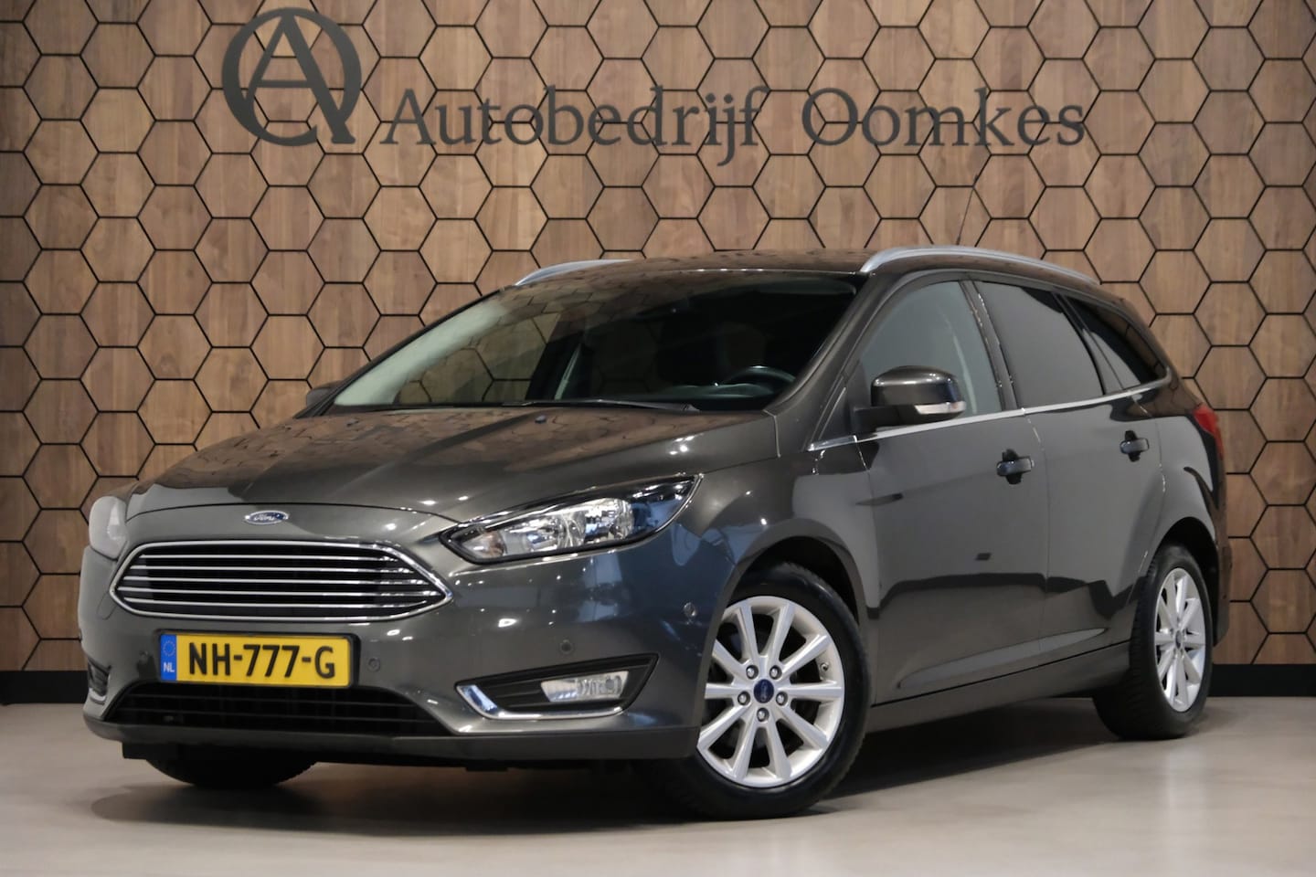 Ford Focus Wagon - 1.0 Titanium*Cruise control*Navi*Stoelverwarming* - AutoWereld.nl
