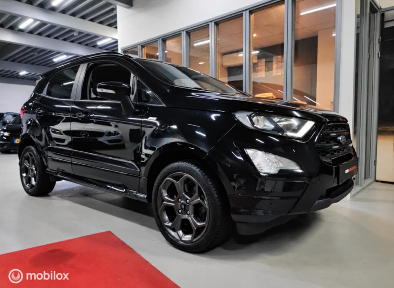 Ford EcoSport - 1.0 EcoBoost ST-LINE NW DISTRIBUTIERIEM TREKHAAK LED CRUISE NAVI LEER CARPLAY CAMERA NW AP - AutoWereld.nl