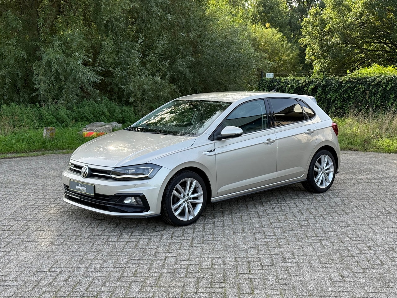 Volkswagen Polo - 1.0 TSI R-LINE PDC I CARPLAY I CRUISE I LEER I CLIMA I 1E EIG I UNIEK - AutoWereld.nl