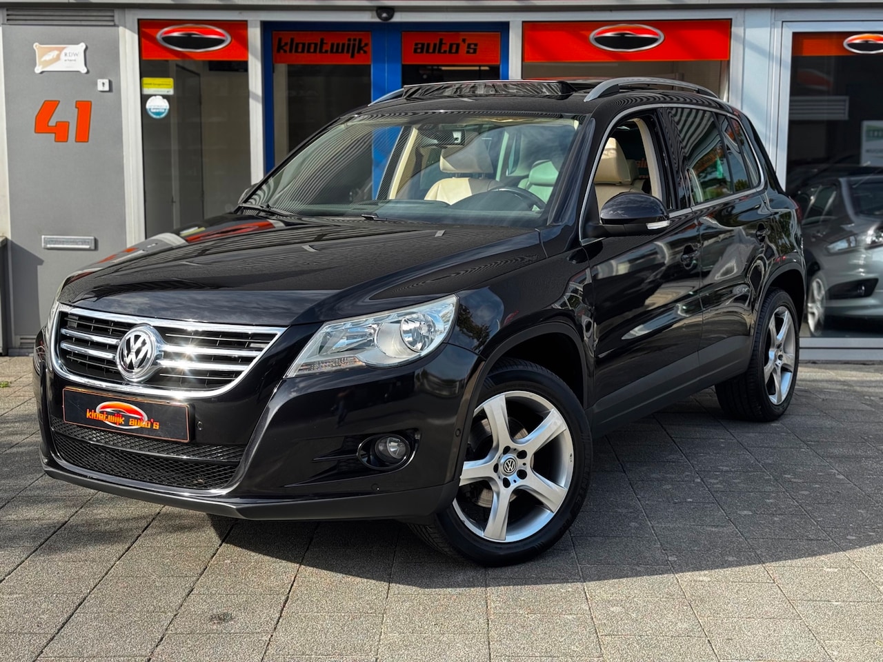Volkswagen Tiguan - 2.0 TSI Sport&Style 4Motion DSG Panorama Leder Navi - AutoWereld.nl