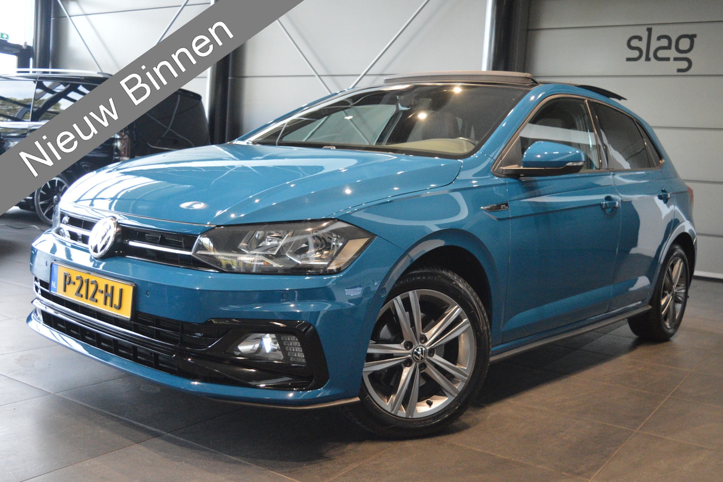 Volkswagen Polo - 1.0 TSI R-LINE navi pano camera pdc trekhaak !! - AutoWereld.nl