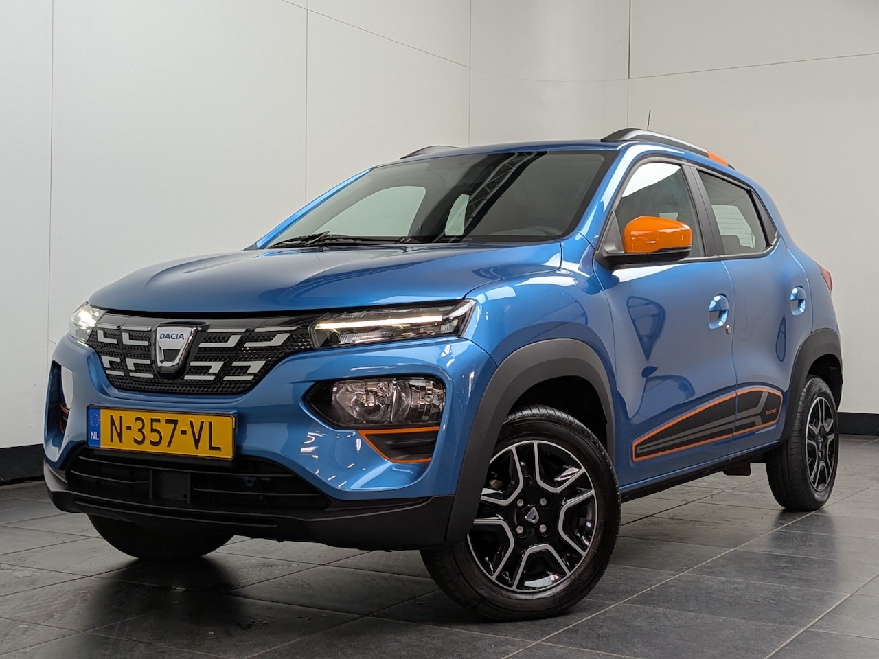 Dacia Spring - Comfort Plus 27 kWh | SOH 91% | 1e Eigenaar! | Camera | Navigatie | Cruise Control | Airco - AutoWereld.nl