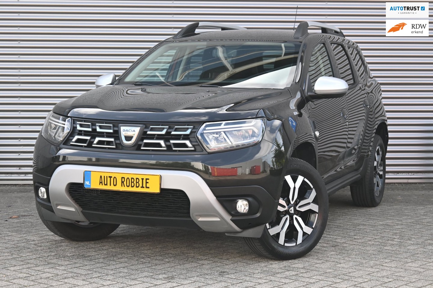 Dacia Duster - 1.3 TCe Prestige 1.3 TCe Prestige, Airco, Ecc, Cruise, Navi, Camera, Trekhaak. - AutoWereld.nl