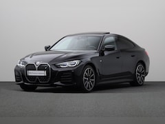 BMW i4 - eDrive40 High Executive 84 kWh M-Sport | Camera | Stoelverwarming | Hi-Fi | Open dak | 19"