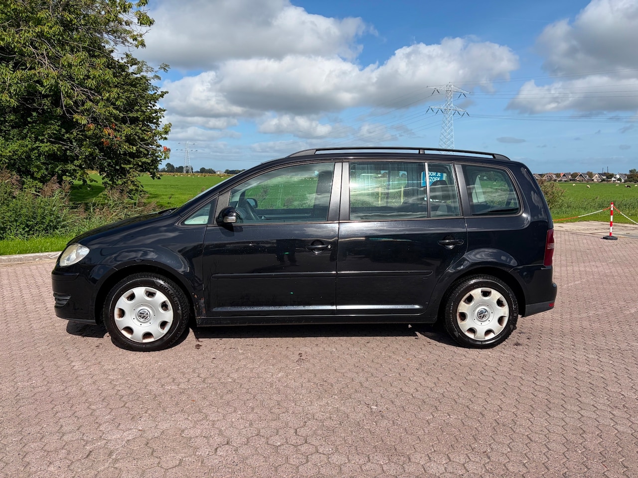 Volkswagen Touran - 1.6 7 PERS - AutoWereld.nl
