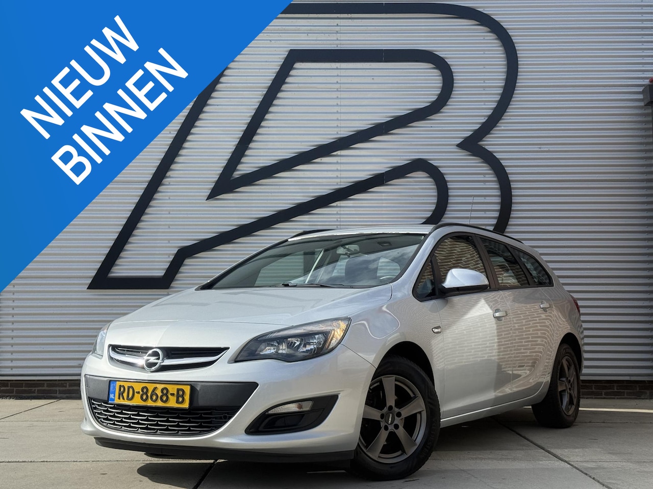 Opel Astra Sports Tourer - 1.4 Edition Airco|Cruise|Elek ramen|Lm velgen|Goed onderhouden|APK tot 01-2027 - AutoWereld.nl