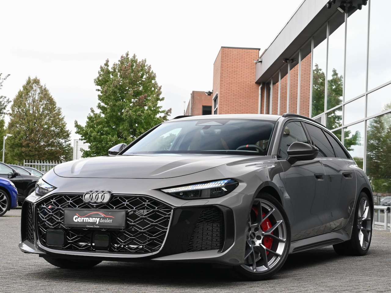 Audi RS5 - Avant RS5 2.9TFSI V6 BiTurbo 639pk eHybrid Quattro Keramisch 3xCarbon Pano Tech Pro M-Led - AutoWereld.nl