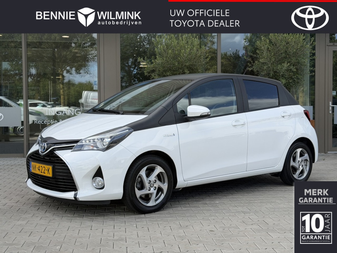 Toyota Yaris - 1.5 Hybrid Trend Bi-Tone | Leer | Navigatie | LM Velgen - AutoWereld.nl